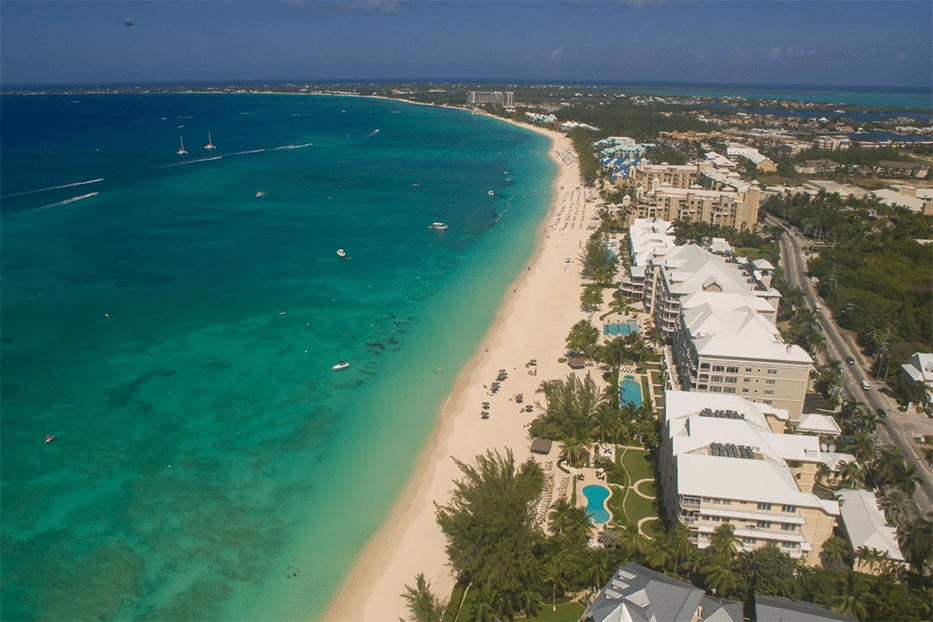 Aerial view of The Meridian beach resort on Seven Mile Beach, Grand Cayman