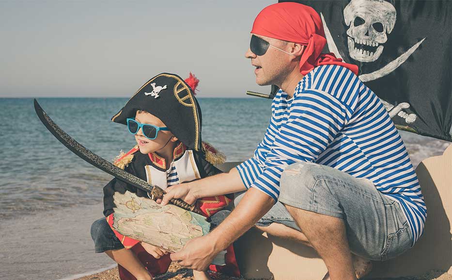 A father and son dressed up as pirates for Pirates week celebrations on Grand Cayman.