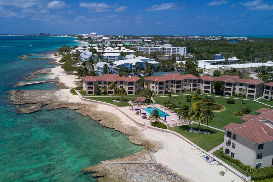 Aerial view of the pool and beach at George Town Villas, Grand Cayman