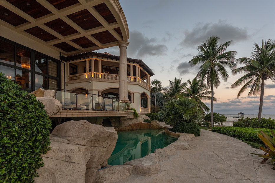 Castillo Caribe, Grand Cayman, views from the garden overlooking the pool to the balcony