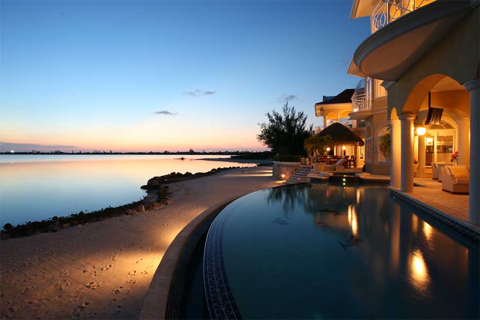 Cayman Islands beach front house at sunset