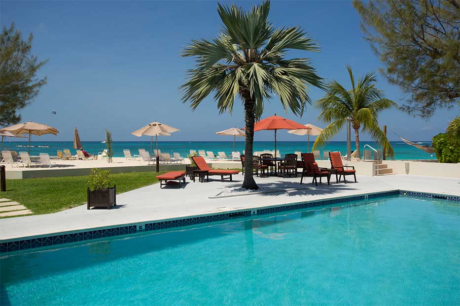 Views from Plantana Condominums over the swimming pool towards Seven Mile Beach, Grand Cayman