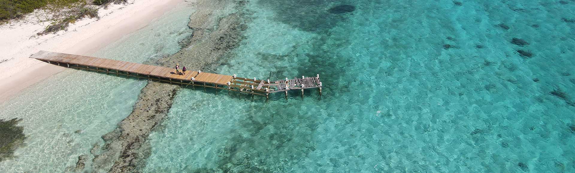 Cayman Islands beach with dock