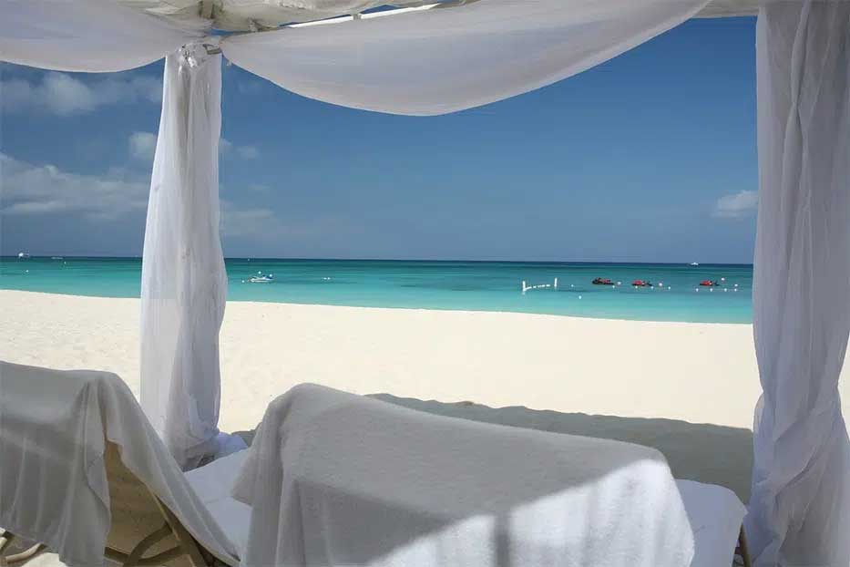 Relax in a beachfront Cabana at The Ritz-Carlton Grand Cayman