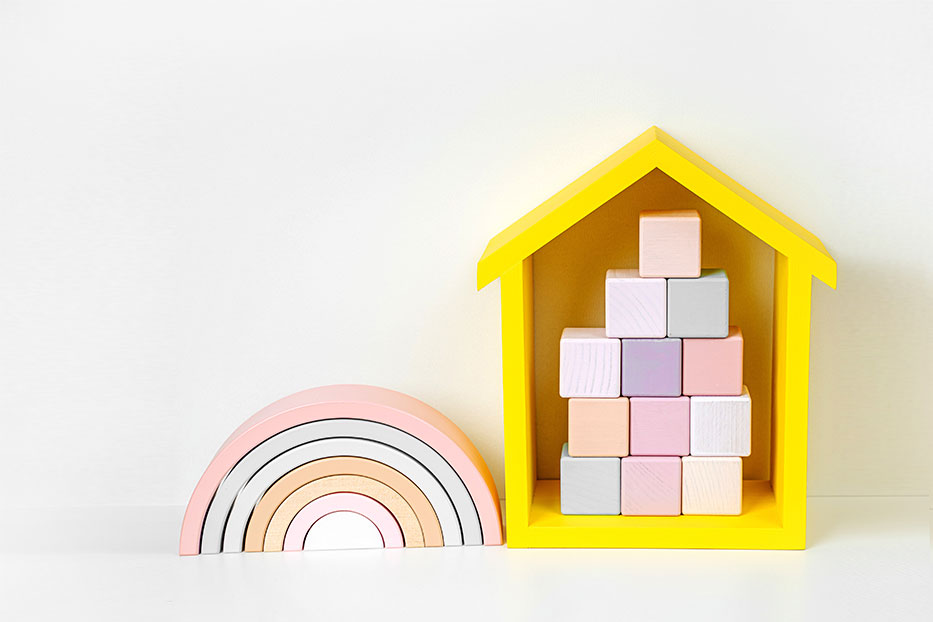 Colourful wooden bricks and shapes for nursery children