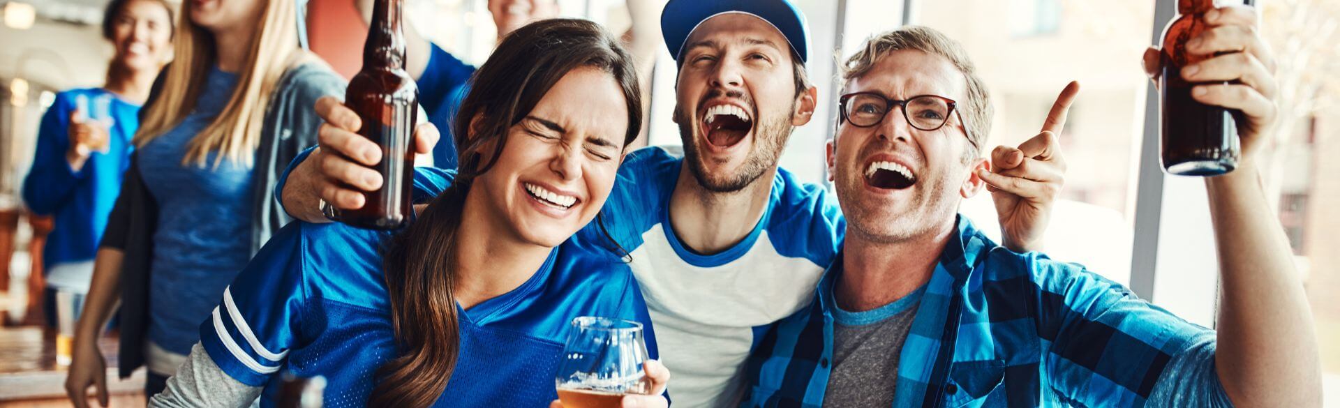 Sports fans enjoying the game.